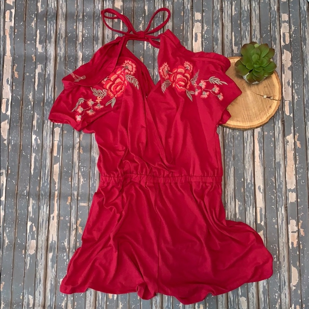 Super cute for summer. Pink floral romper.